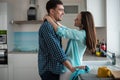 Young happy couple hugging and looking at each other in the interior of a new kitchen, happiness in a new home. Royalty Free Stock Photo