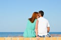 Young happy couple kissing on sandy beach Royalty Free Stock Photo