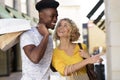 Young happy couple looking each other after shopping Royalty Free Stock Photo