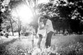 Young happy couple in love together on park landscape sunset with woman pregnant belly Royalty Free Stock Photo