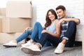 Young happy couple moving into their new home Royalty Free Stock Photo