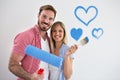 Young happy couple painting new apartment Royalty Free Stock Photo