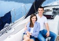 A Young And Happy Couple Relaxing On A Boat