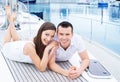 A young and happy couple relaxing on a boat Royalty Free Stock Photo