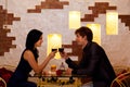 Young happy couple romantic date drink glass of Royalty Free Stock Photo