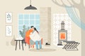 Young happy couple sitting in a chair and drinking tea. Man and woman enjoying evening near the fireplace in a cozy room Royalty Free Stock Photo