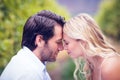 Young happy couple sitting face to face Royalty Free Stock Photo