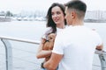 Young happy couple on walk with small dog Royalty Free Stock Photo