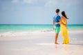 Young happy couple on white beach at summer vacation Royalty Free Stock Photo