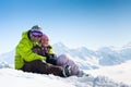 Young happy couple in winter mountains Royalty Free Stock Photo