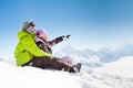 Young happy couple in winter mountains Royalty Free Stock Photo