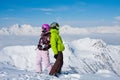 Young happy couple in winter mountains Royalty Free Stock Photo