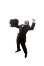 Young happy and excited businessman holding suitcase celebrating promotion and success at work