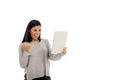 Young happy and excited hispanic woman holding digital tablet pad smiling isolated on white Royalty Free Stock Photo