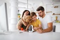 Young happy family having fun, being playful at home Royalty Free Stock Photo