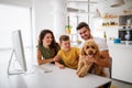 Young happy family having fun, being playful at home Royalty Free Stock Photo