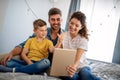 Young happy family having fun, being playful at home Royalty Free Stock Photo