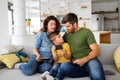 Young happy family having fun, being playful at home Royalty Free Stock Photo