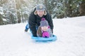 Young happy father and her daughter enjoying a Royalty Free Stock Photo