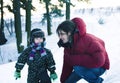 Young happy father with his son little cute boy outside in winter park, lifestyle people concept Royalty Free Stock Photo