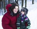 Young happy father with his son little cute boy outside in winter park, lifestyle people concept Royalty Free Stock Photo