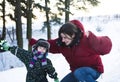 Young happy father with his son little cute boy outside in winter park, lifestyle people concept Royalty Free Stock Photo