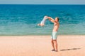 Young happy father playing with his baby at the beach Royalty Free Stock Photo