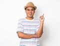 Young happy&funny asian man pointing finger on blank space for text. Royalty Free Stock Photo