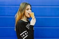 Young happy girl eating ice-cream Royalty Free Stock Photo