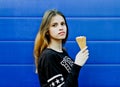 Young happy girl eating ice-cream Royalty Free Stock Photo