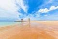 Happy girl run by wide sand beach Royalty Free Stock Photo