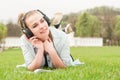 Young happy girl with headphones listening music Royalty Free Stock Photo