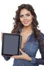 A young and happy girl holding a tablet computer Royalty Free Stock Photo