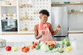 girl kitchen singing woman female happy beautiful fun young home cheerful lifestyle music Royalty Free Stock Photo