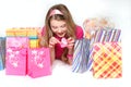 Young happy gril with shopping bags and gift