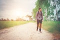 Young happy hipster traveler walking overcome big way smiling lo Royalty Free Stock Photo