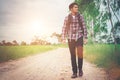 Young happy hipster traveler walking overcome big way smiling lo Royalty Free Stock Photo