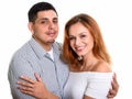 Young happy Hispanic couple smiling while hugging each other Royalty Free Stock Photo