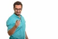 Young happy Indian man pointing finger at camera Royalty Free Stock Photo