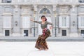 Young happy Indonesian woman from Bali having vacation in Europe - beautiful and exotic Balinese tourist girl dancing in Royalty Free Stock Photo