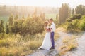 Young happy just married couple posing on the top of the mountain Royalty Free Stock Photo