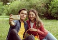 Young, happy, loving couple having date in the park. Relations, friendship and love. Royalty Free Stock Photo