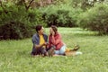 Young, happy, loving couple having date in the park. Relations, friendship and love. Royalty Free Stock Photo