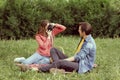 Young, happy, loving couple having date in the park. Relations, friendship and love. Royalty Free Stock Photo