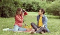 Young, happy, loving couple having date in the park. Relations, friendship and love. Royalty Free Stock Photo