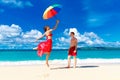 Young happy loving couple having fun in the tropical beach with Royalty Free Stock Photo