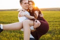 Young, happy, loving couple, outdoors, man holding a girl in his arms , and enjoying each other, advertising, and inserting text Royalty Free Stock Photo