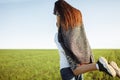 Young, happy, loving couple, outdoors, man holding a girl in his arms , and enjoying each other, advertising, and inserting text Royalty Free Stock Photo