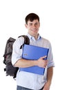 Young, happy male student with backpack and folder