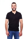 Young happy man in a black polo shirt Royalty Free Stock Photo